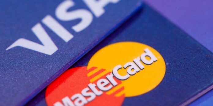 Visa și Mastercard, aproape de un acord cu comercianții din SUA pentru reducerea comisioanelor